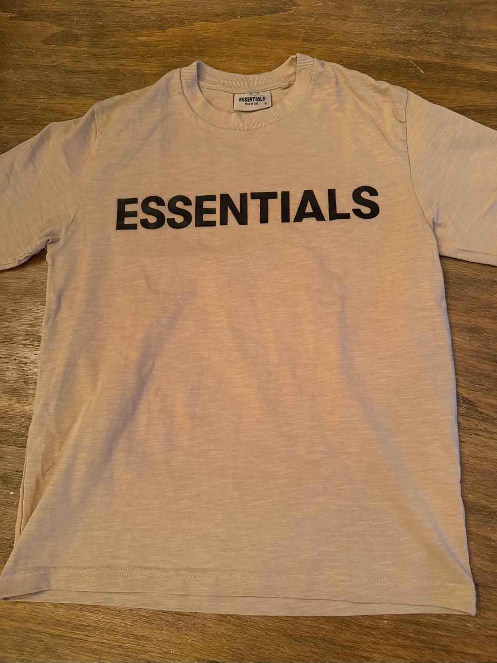 ESSENTIALS Logo Tee in Light Beige with Black Print Small